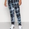 YOURTURN Monochrome Tie Dye Jogger Unisex - Trainingsbroek - Black/Off White -Yourturn 0edc31c01d024468a27152acd4fe8944