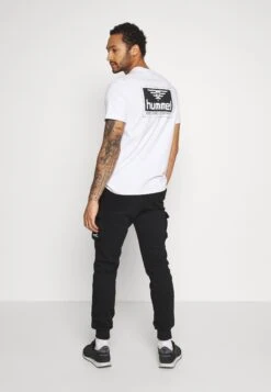 YOURTURN Unisex - Trainingsbroek - Black 9 YOURTURN Unisex - Trainingsbroek - Black -Yourturn 37e11c7cc85b4c32935b63421ffc599f