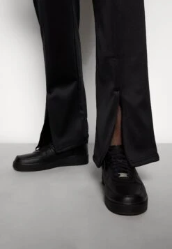 YOURTURN Unisex - Trainingsbroek - Black -Yourturn 5c4f8c8cb63e40f79401d8fdfffc3743