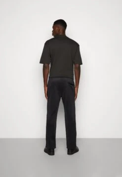 YOURTURN Unisex - Trainingsbroek - Black -Yourturn b4ad6068df1f4c538a4520b01ec3793c