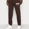 YOURTURN Unisex - Trainingsbroek - Dark Brown -Yourturn e1108e6c89a84640b8c8bc8fe7ba75bc